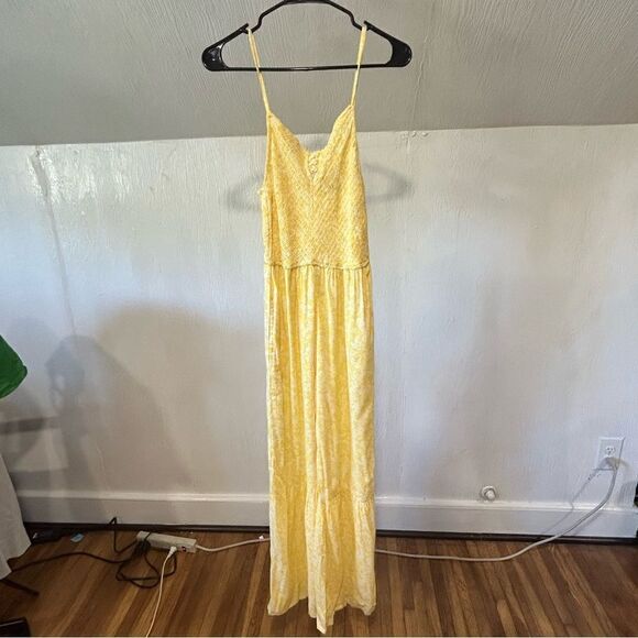 Revolve Sincerely Jules Yellow Spaghetti Strap Floral Flare Leg Jumpsuit - Picture 1 of 9